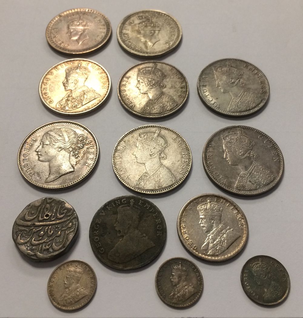 INDIA SILVER 14 COINS LOT
2 ANNA , Half Rupee and 1 Rupee 1840-1943
And Rare Nickel 8 Annas 1919