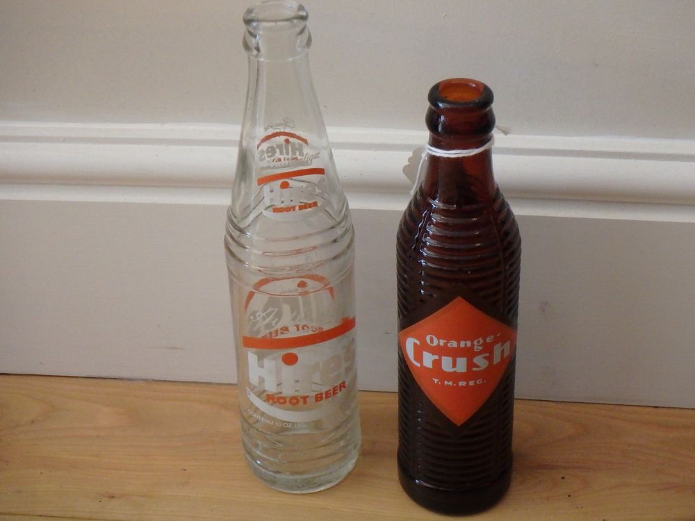Lot 2: Vintage 1940’s Orange Crush brown ribbed bottle together...