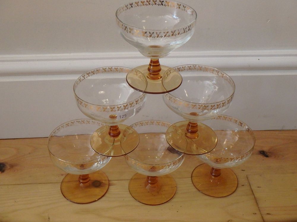 Lot 12: Six Lovely Amber Base Champagne Glasses