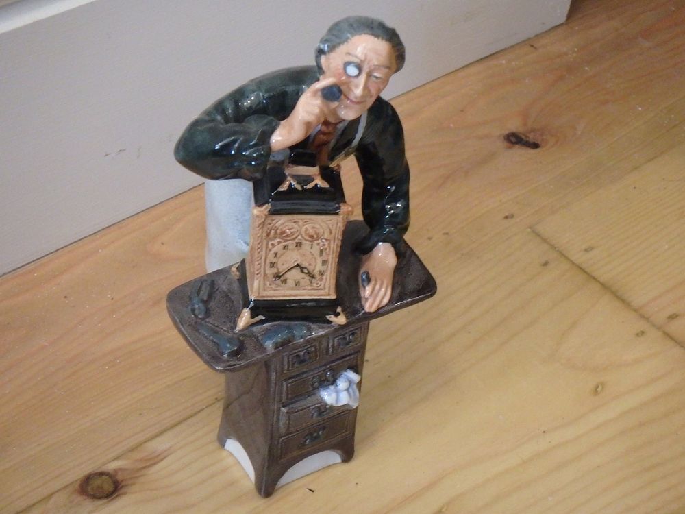 Lot 69: Royal Daulton “The Clockmaker” Figurine