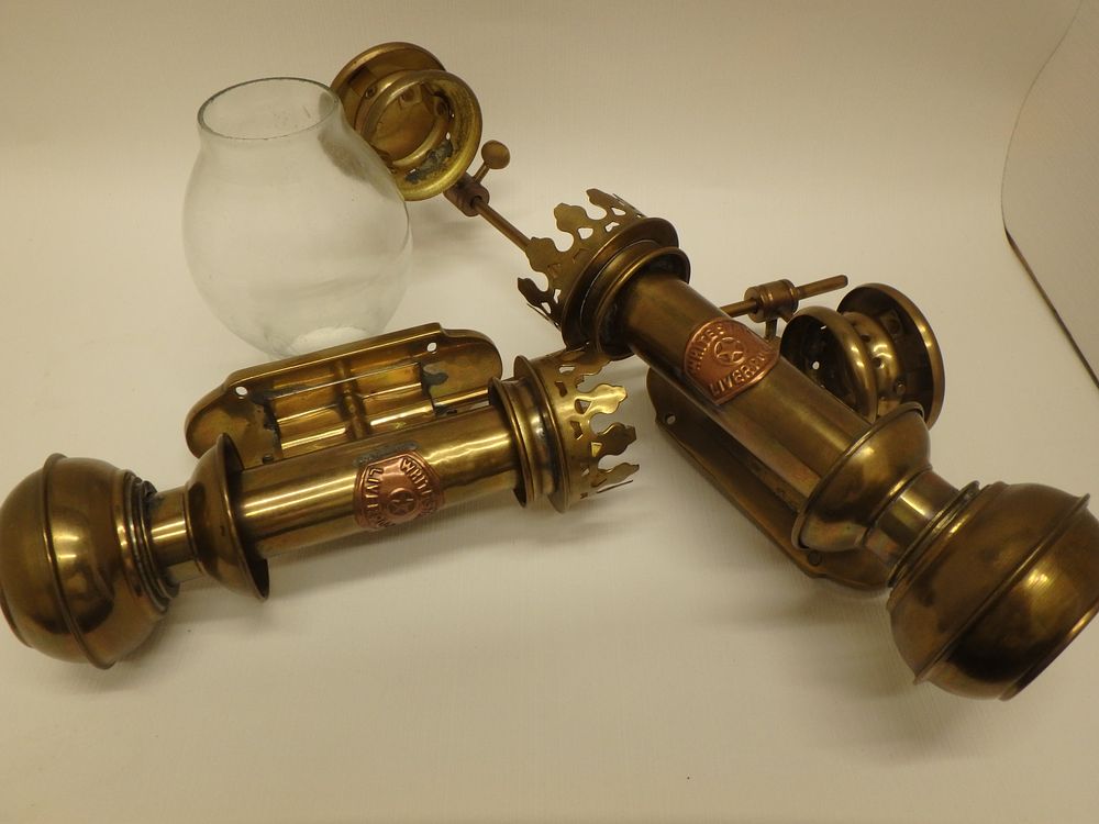 Lot 513: Brass Wall Lights marked White Star Line Liverpool