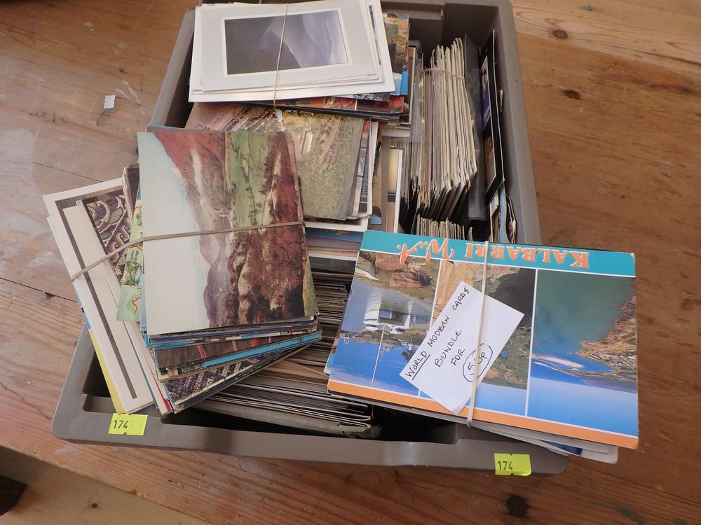Lot 516: Box of 100’s of Postcards at least 80...