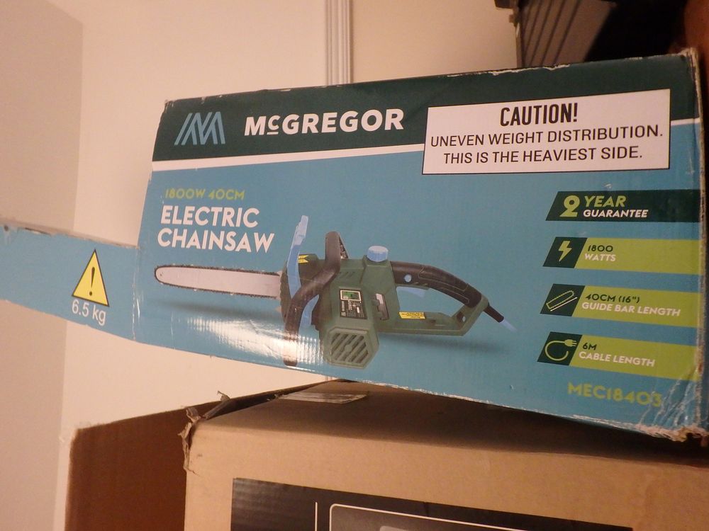 Lot 518: McGregor Electric Chainsaw