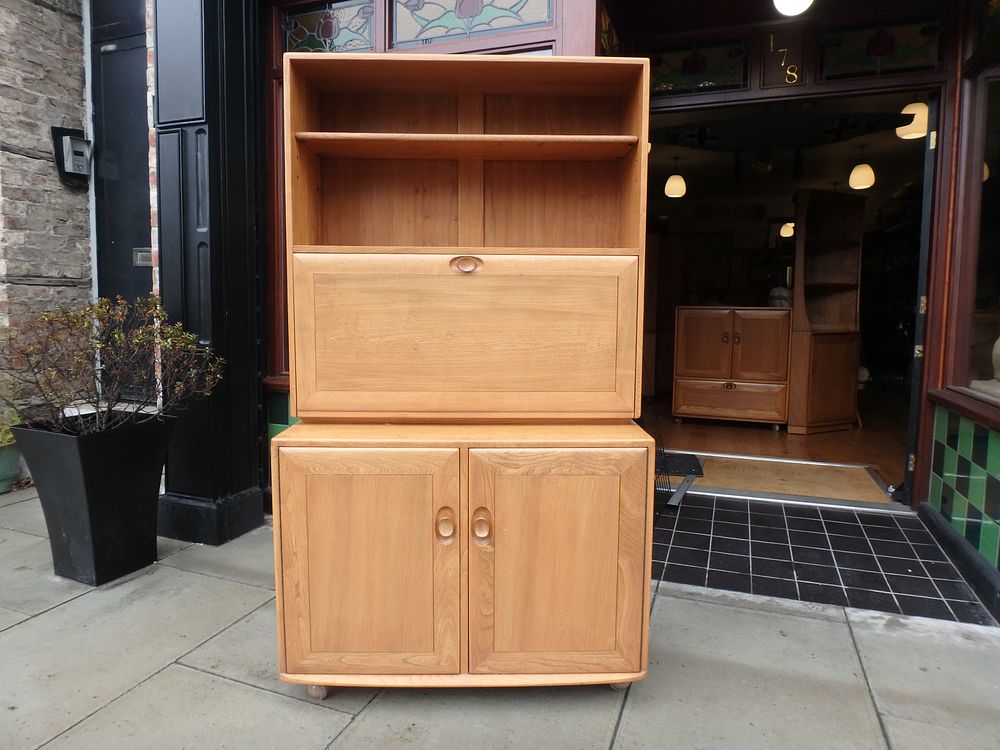 Lot 556: Mid Century Ercol Windsor Bureau/Drinks Cabinet