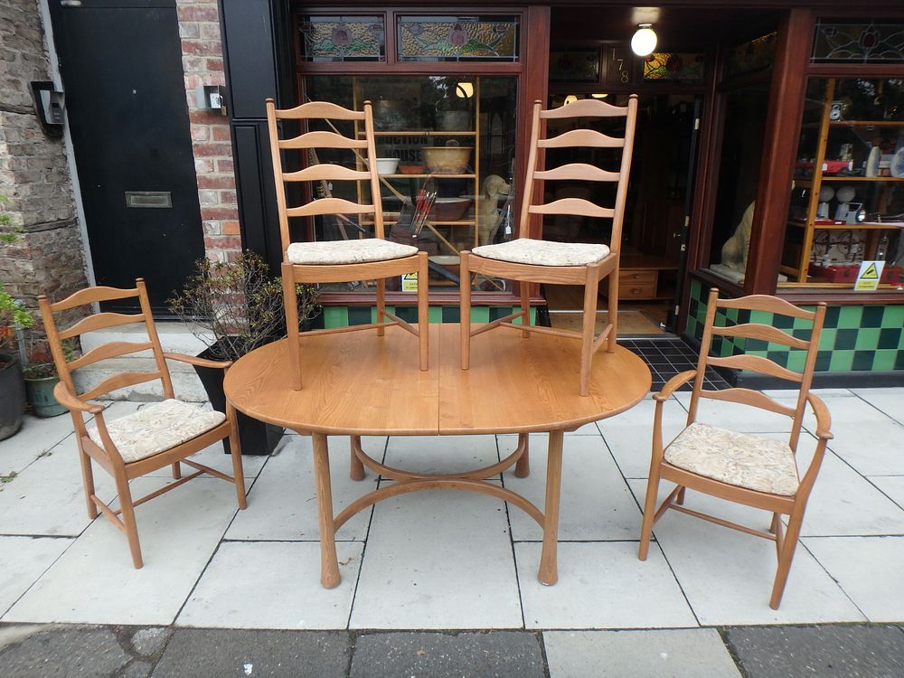 Lot 559: Mid-Century Ercol Saville Table with Four Ercol Saville...