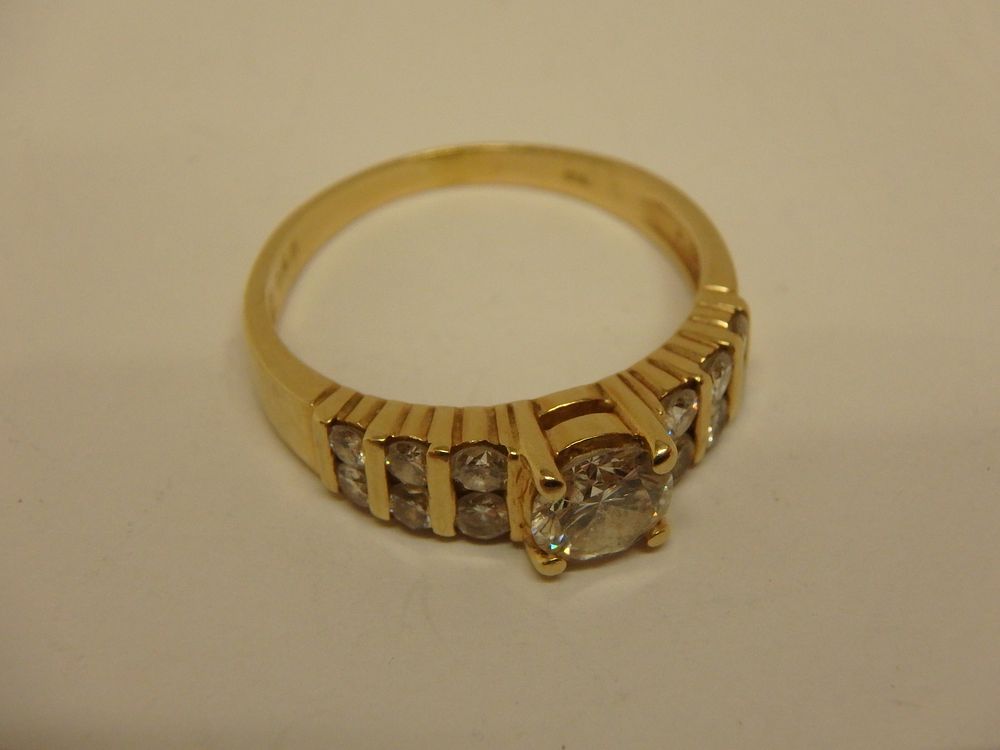 Lot 26: Tension Set Diamond Ring 18ct Gold Size M...