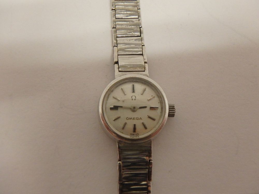 Lot 25: 9ct White Gold Omega Bracelet Watch Total weight...