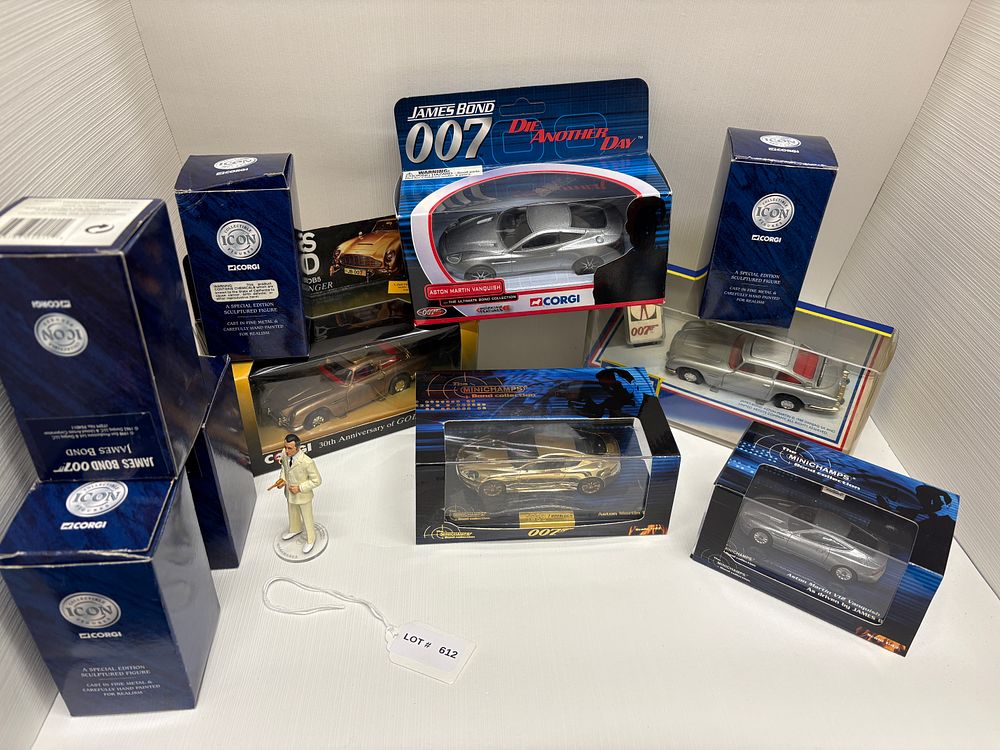 Lot 612: Five Corgi cast metal sculptures with five 007 die cast cars