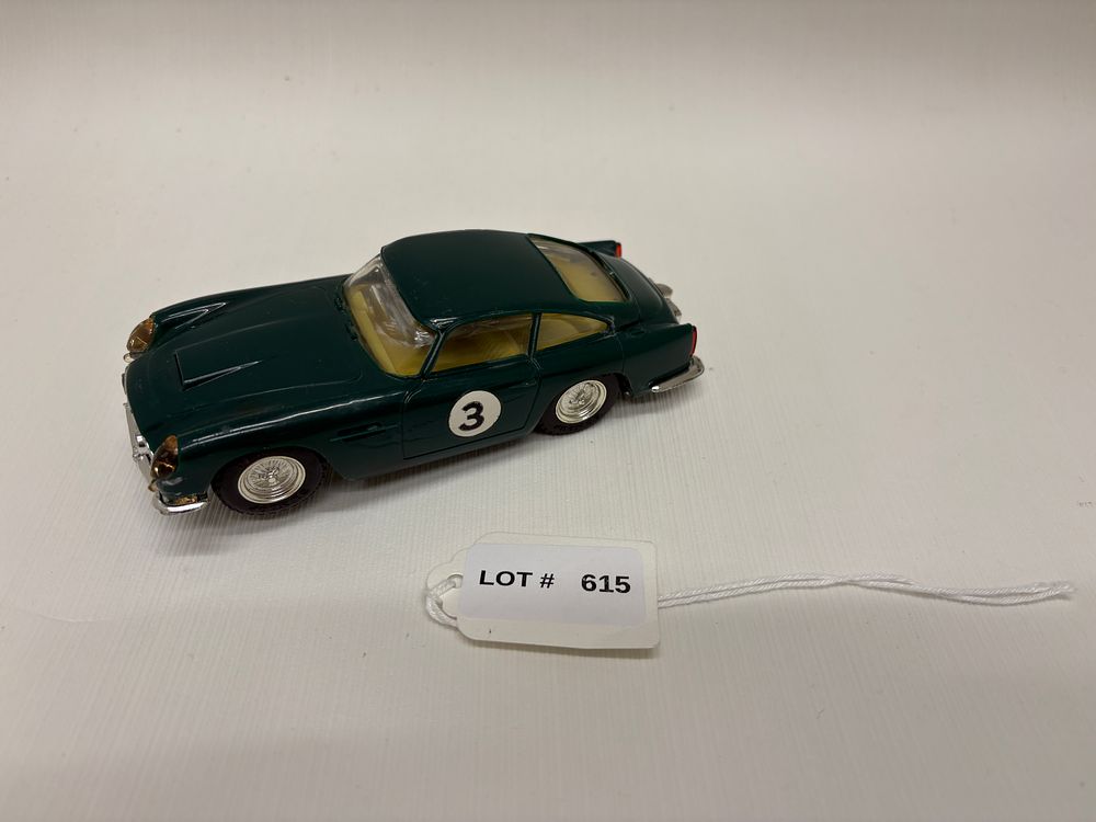 Lot 615: vintage scale x tric C68 Aston Martin DB4 car green motor
