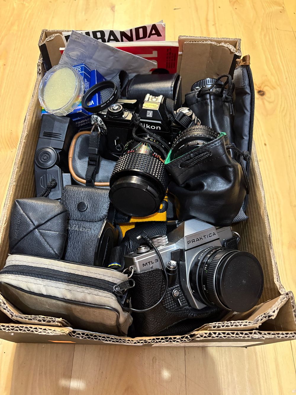 Lot 637: Nikon Camera 2 Lenses Praktica Camera plus several accessories