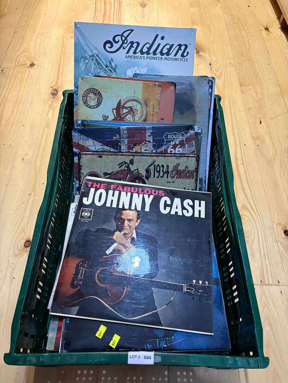 Lot 644: Collection of Jonny Cash LP records and tin signs