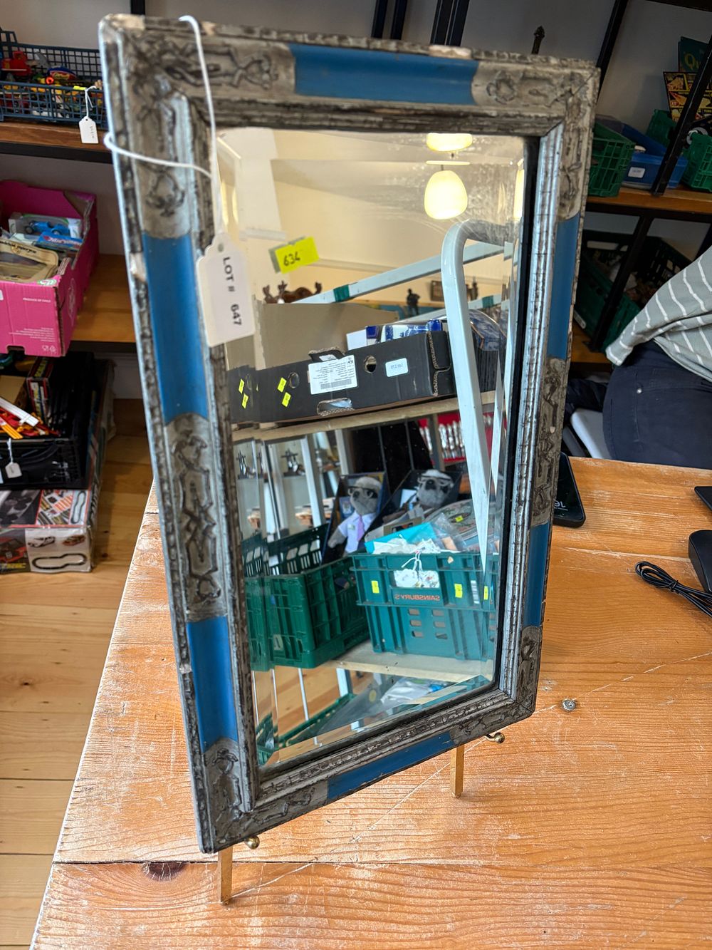 Lot 647: Decorative mirror on brass easel