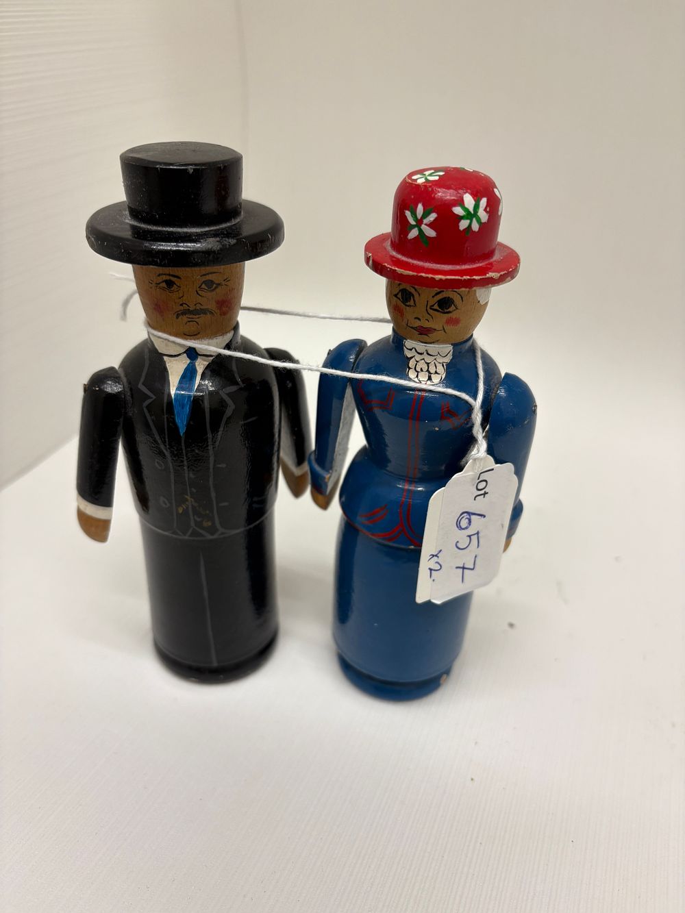 Lot 657: Two vintage Robin and Nell Dale wooden stump dolls