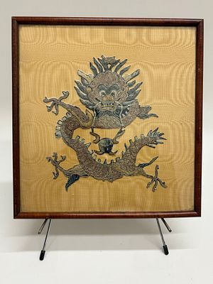 A Framed Chinese Silk Dragon Embroidery. A single framed Chinese silk embroidered textile 