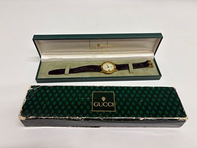 Gucci 3900M Gold-Tone Swiss Made Wristwatch with Box. A gold-tone Gucci 3900M Swiss Made 