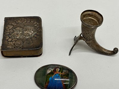 Three Silver-Toned Items: Book, Brooch, and Theodor Olsen Horn. Three silver-toned items: a 