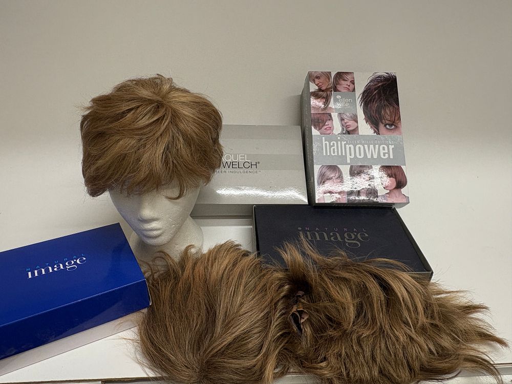 Lot 478: A Collection of Contemporary Wigs by Raquel Welch, Ellen Wille, and Natural Image
