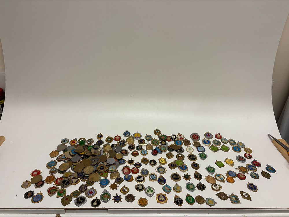Lot 512: A Large Collection of Vintage Commemorative Medals, Pendants, and Charms, Mid-to-Late 20th Century