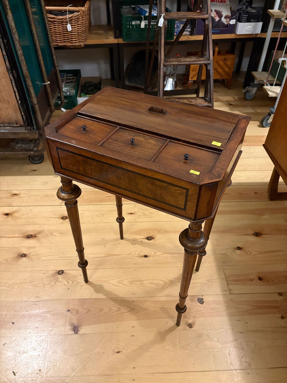 Lot 562: An Early Victorian Burr Walnut and Mahogany tea caddy table