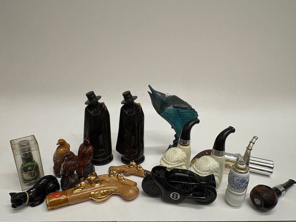 Lot 597: A Collection of Vintage Avon and Novelty Figural Decanters and Cologne Bottles, including Pipe Examples