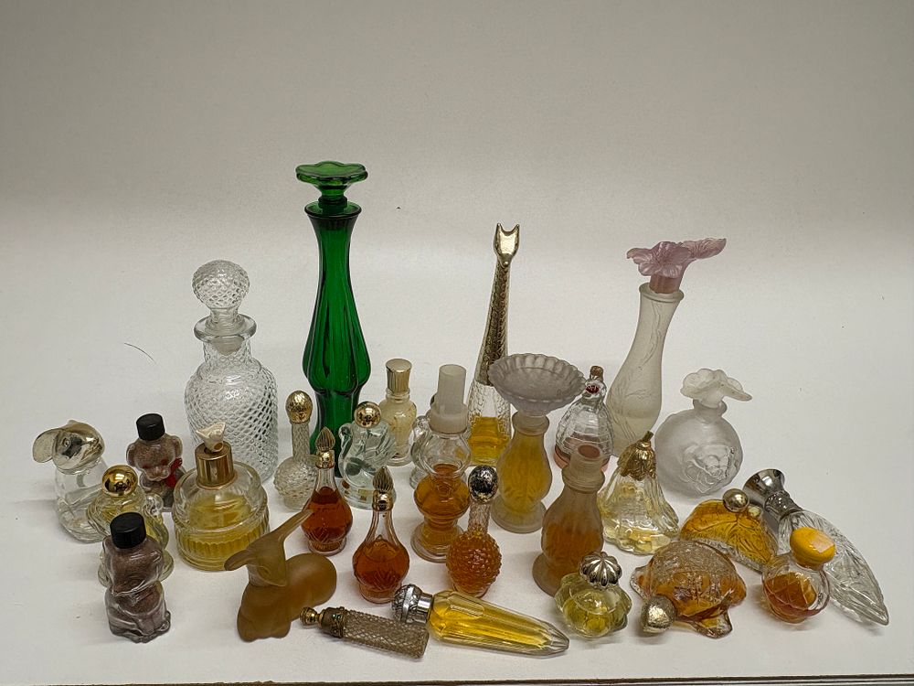 Lot 598: A Collection of Vintage Miniature Perfume Bottles, including Avon