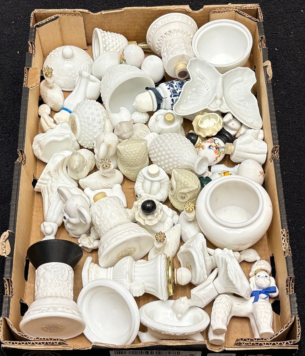 Lot 615: A Collection of Vintage Avon Cosmetics Milk Glass Bottles and Figurines