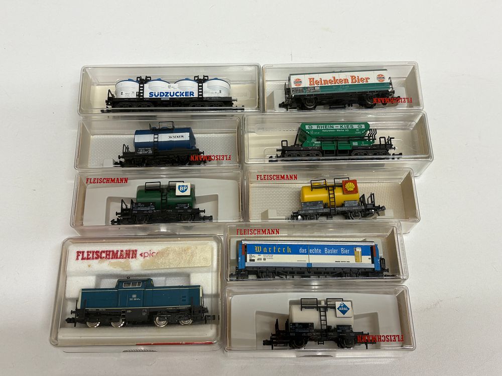 Lot 628: Fleischmann and Minitrix N Scale Mixed International Freight Train with Locomotive and Ten Wagons