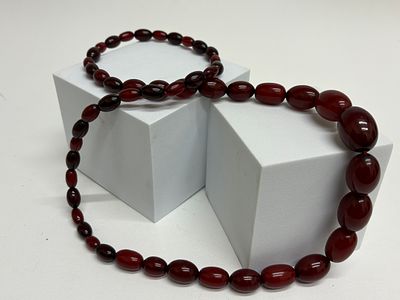 A Coordinating Suite Art Deco Style Cherry Amber Faturan Graduated Bead Strands