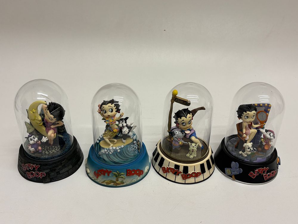 Lot 29: A Collection of Four Limited Edition Betty Boop Hand-Painted Sculptures (1995-1996)