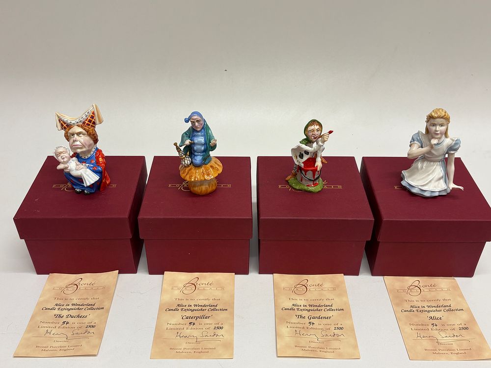 Lot 32: Bronté Porcelain Limited Edition Alice in Wonderland Candle Extinguishers Collection of Four