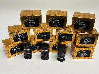 A Collection of 11 Computar FA Megapixel M5028-MPW2 Industrial Lenses. A collection of eleven 