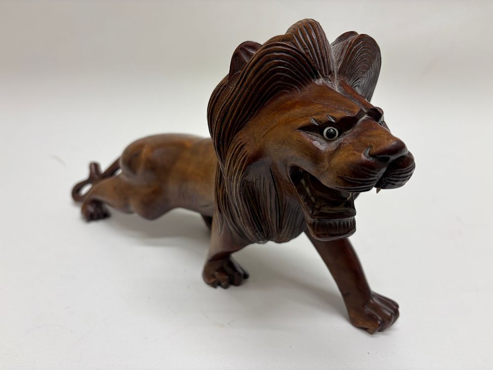 Lot 53: Vintage Hand-Carved Hardwood Lion Sculpture with Inlaid Teeth