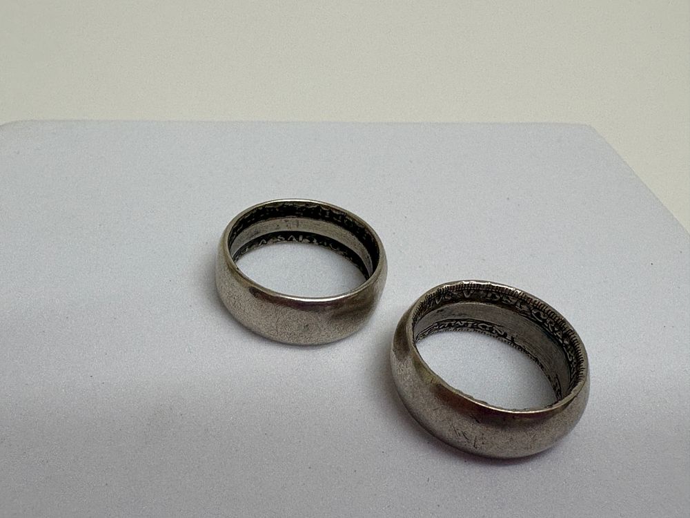 Lot 66: A Pair of Wide Band silver wedding Coin Rings hand fashioned from actual coins 50\5 silver 11.7g