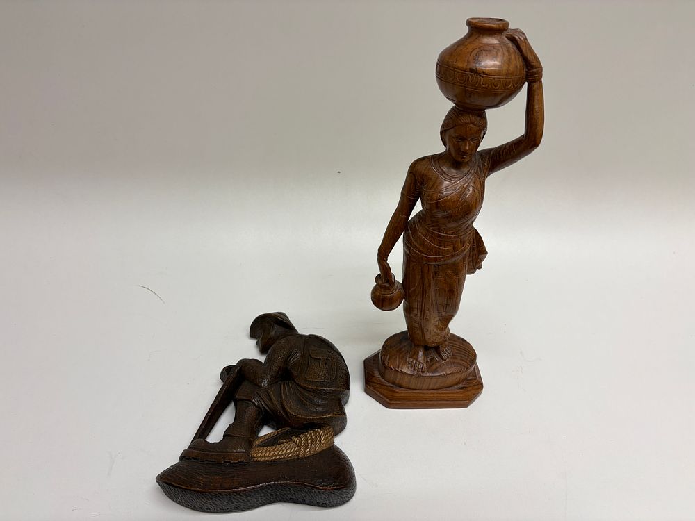 Lot 54: A Pair of Mid-Century Hand-Carved Figurative Wood Sculptures