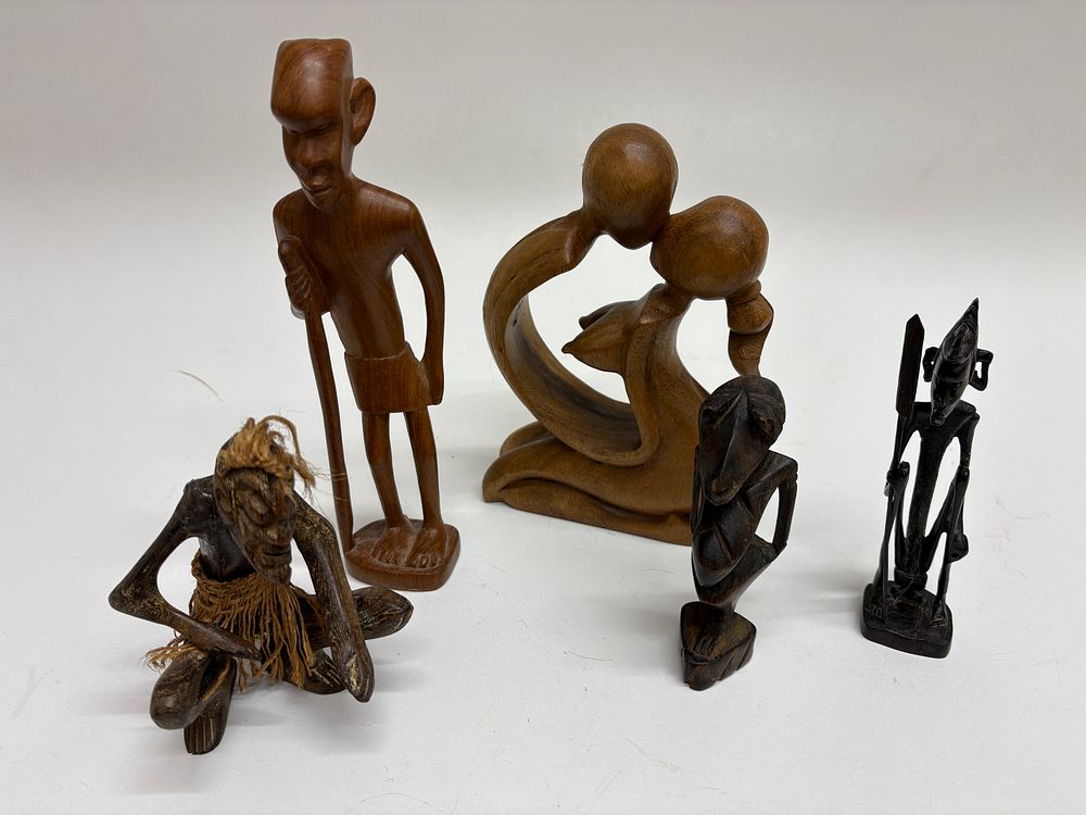 Lot 55: A Collection of Four Hand-Carved Wooden African-Style Figural Sculptures