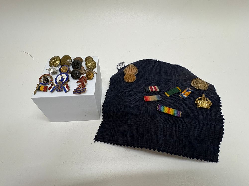Lot 69: A Collection of Military and Commemorative Insignia, Badges, Buttons, and Ribbon Bars