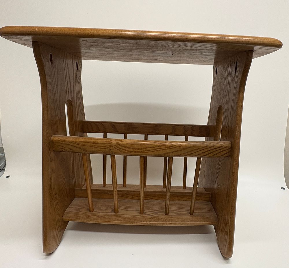 Lot 641: An Ercol Mid-Century Modern Ash and Elm Magazine Rack Table