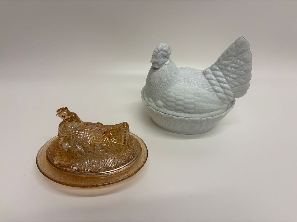 Lot 639: A Pair of Vintage Pressed Glass Hen-on-Nest Decorative Items, Mid-20th Century