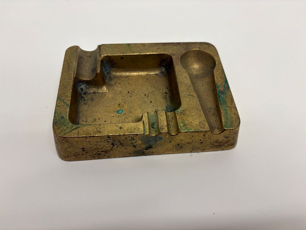 Lot 646: A Mid-Century Modern Cast Brass Ashtray and Pipe Rest