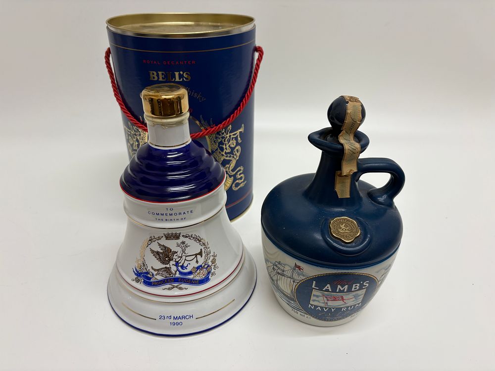 Lot 676: Two Ceramic Spirits Decanters comprising Bell's Scotch Whisky and Alfred Lamb's Navy Rum