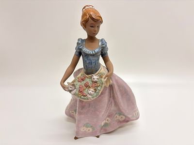 Lladr&oacute; Porcelain Figurine, "An Apron Full of Joy" (2428), c. 2000. This fine porcelain figurine 