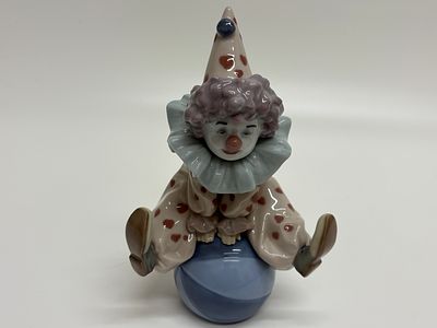 Lladr&oacute; Porcelain Figurine, Having a Ball Pierrot Model 05813, Circa 1990. A fine Lladr&oacute; glazed 