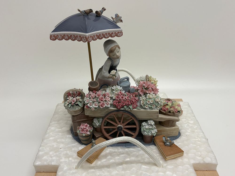 Lladro Flowers of the Season Porcelain Figurine Model 1454 Circa 1983. A significant and highly 