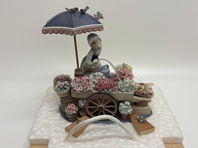 Lladro Flowers of the Season Porcelain Figurine Model 1454 Circa 1983. A significant and highly 