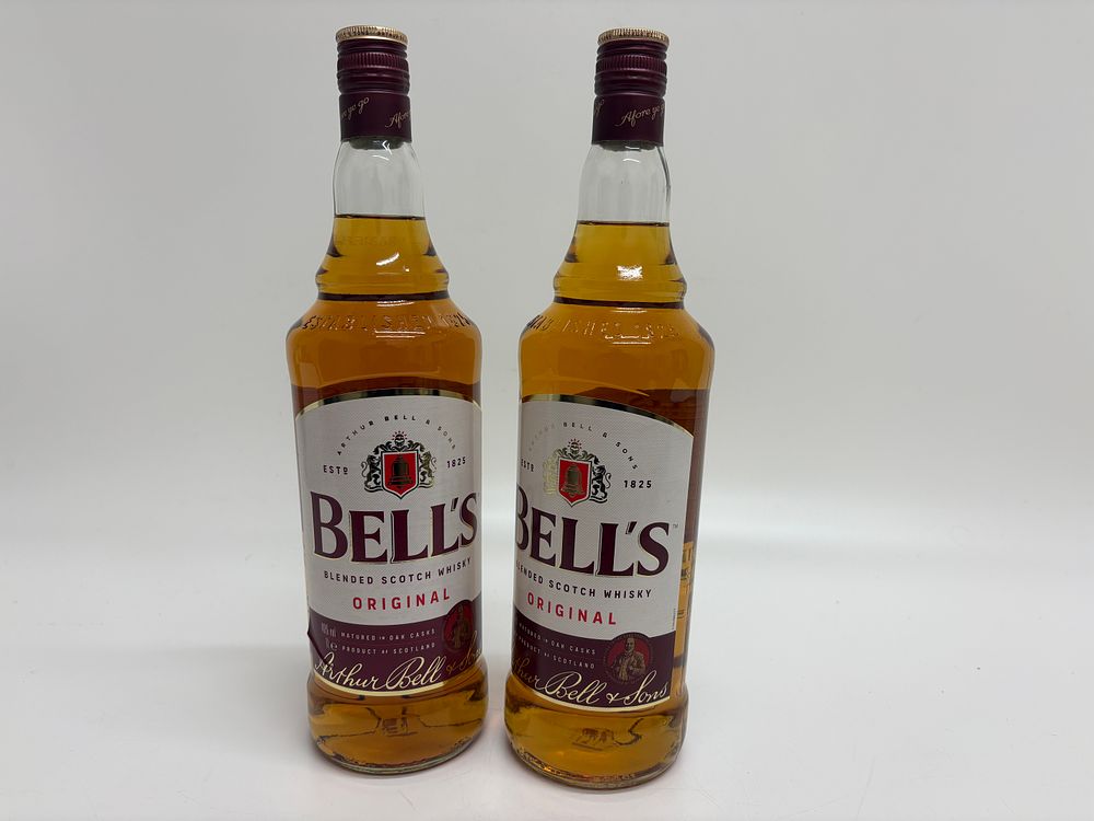 Lot 677: Arthur Bell & Sons, Two Bottles of Bell's Original Blended Scotch Whisky, 1 Litre, Oak Cask Matured