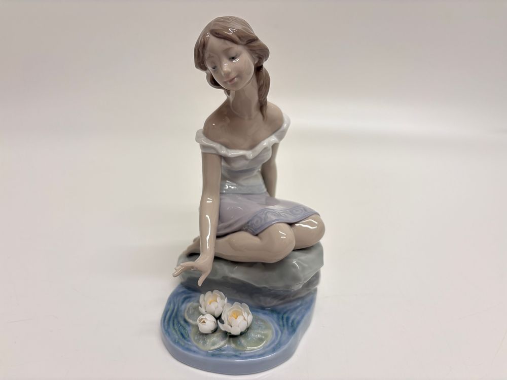 Lladro, Reflections of Helena / Magical Moment (Model #7706). A Lladro glazed porcelain figurine 