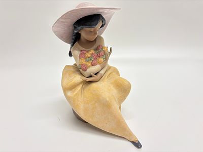 Lladro, Fragrant Bouquet (Model 2305). A Lladro Gres porcelain figurine titled Fragrant Bouquet 
