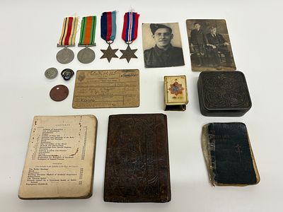 A Collection of Second World War Service Medals and Ephemera Relating to Private Walter A. Duggan. 