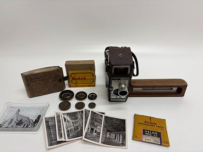 A Collection of Vintage Photography Equipment and Collectables including a Bell and Howell 