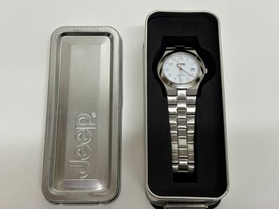 A Jeep Branded Stainless Steel Wristwatch with Original Presentation Tin. A Jeep branded 